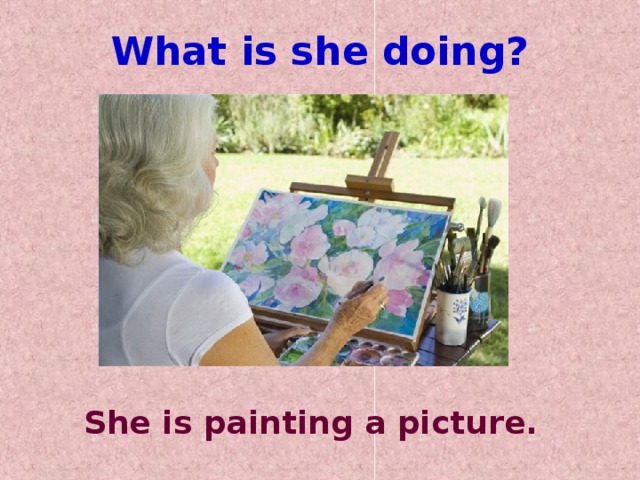 What is she doing? She is painting a picture.